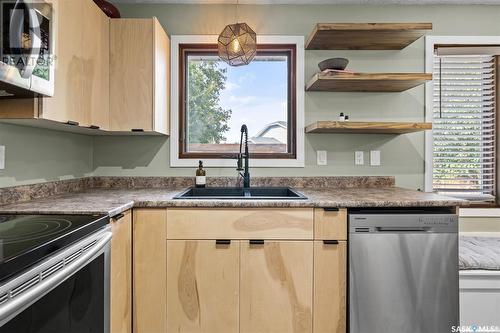 306 Waterbury Road, Saskatoon, SK - Indoor Photo Showing Kitchen With Double Sink