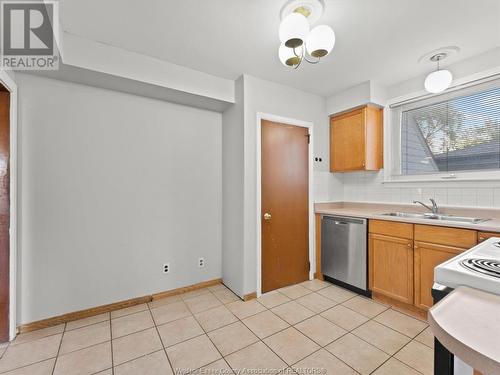 2468 Norman Road, Windsor, ON - Indoor Photo Showing Kitchen With Double Sink