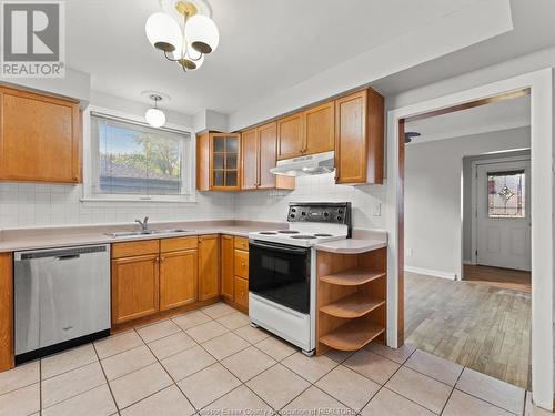 2468 Norman Road, Windsor, ON - Indoor Photo Showing Kitchen With Double Sink