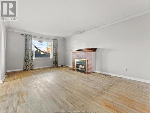 2468 Norman Road, Windsor, ON - Indoor Photo Showing Living Room With Fireplace