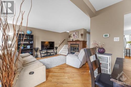 6457 Beausejour Drive, Ottawa, ON - Indoor Photo Showing Living Room With Fireplace