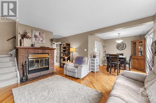 6457 Beausejour Drive, Ottawa, ON - Indoor Photo Showing Living Room With Fireplace