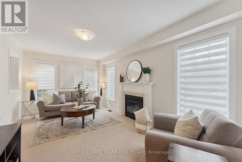 44 - 1640 Grandview Street N, Oshawa (Taunton), ON - Indoor Photo Showing Living Room With Fireplace