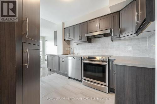 1310 - 2177 Burnhamthorpe Road W, Mississauga, ON - Indoor Photo Showing Kitchen With Stainless Steel Kitchen With Upgraded Kitchen