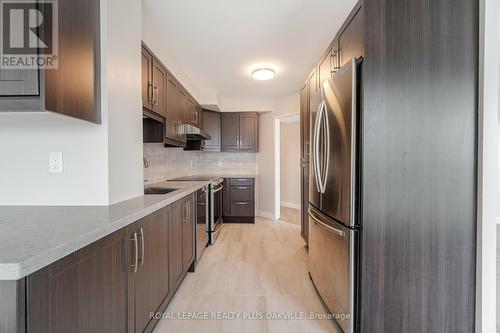 1310 - 2177 Burnhamthorpe Road W, Mississauga (Erin Mills), ON - Indoor Photo Showing Kitchen