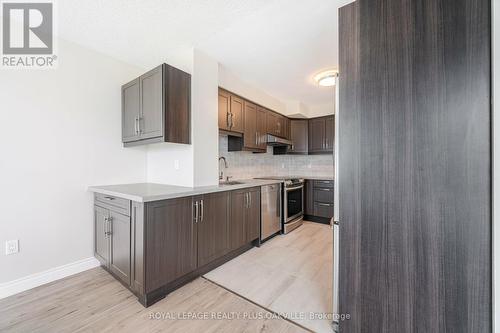 1310 - 2177 Burnhamthorpe Road W, Mississauga (Erin Mills), ON - Indoor Photo Showing Kitchen