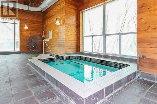 1310 - 2177 Burnhamthorpe Road W, Mississauga (Erin Mills), ON - Indoor Photo Showing Other Room With In Ground Pool