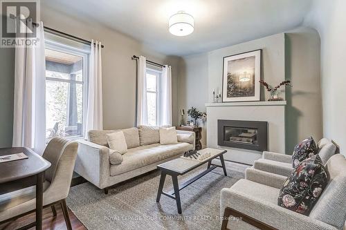 23 Springhurst Avenue, Toronto, ON - Indoor Photo Showing Living Room With Fireplace