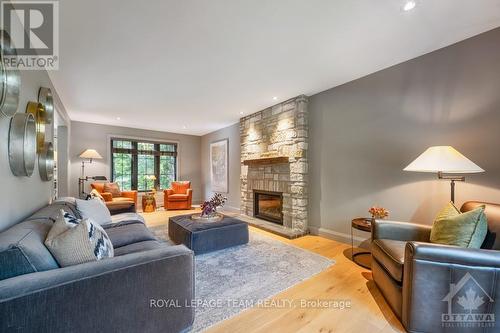 4794 Massey Lane, Ottawa, ON - Indoor Photo Showing Living Room With Fireplace