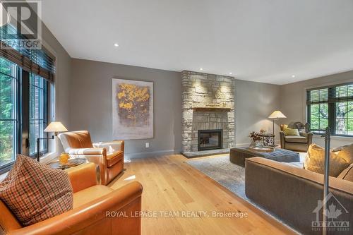 4794 Massey Lane, Ottawa, ON - Indoor Photo Showing Living Room With Fireplace