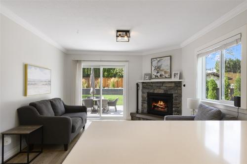 5136 Lark Street, Kelowna, BC - Indoor Photo Showing Living Room With Fireplace