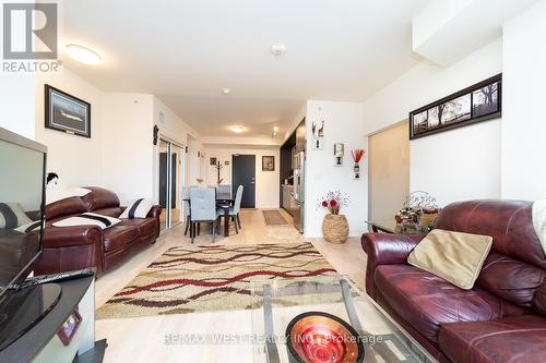 301 - 1575 Lakeshore Road W, Mississauga, ON - Indoor Photo Showing Living Room