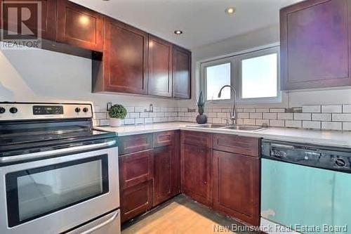 26 Salisbury Road, Moncton, NB - Indoor Photo Showing Kitchen With Double Sink