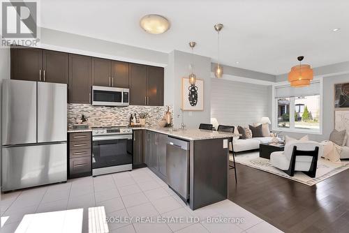 6 - 5030 Corporate Drive, Burlington, ON - Indoor Photo Showing Kitchen With Stainless Steel Kitchen With Upgraded Kitchen