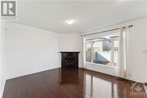 241 Dave Smith Crescent, Ottawa, ON - Indoor Photo Showing Other Room With Fireplace