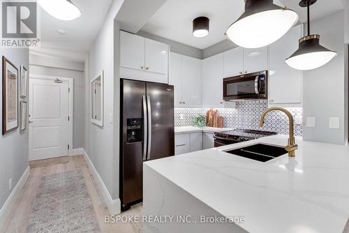 B08 - 245 Dalesford Road, Toronto (Stonegate-Queensway), ON - Indoor Photo Showing Kitchen With Double Sink With Upgraded Kitchen