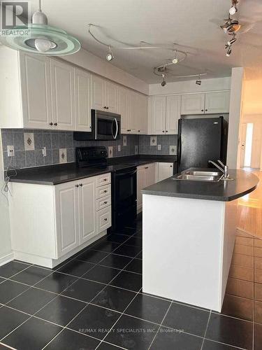 5882 Blue Spruce Avenue, Burlington (Orchard), ON - Indoor Photo Showing Kitchen With Double Sink