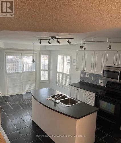 5882 Blue Spruce Avenue, Burlington (Orchard), ON - Indoor Photo Showing Kitchen With Double Sink