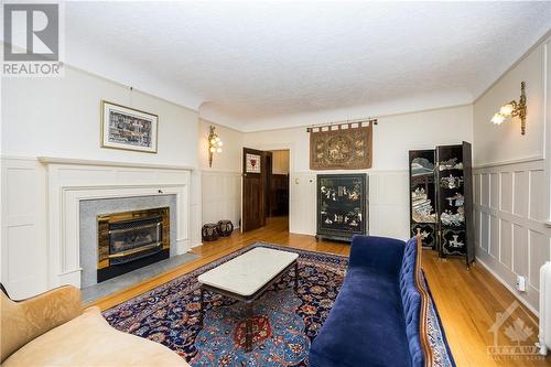 290 Clemow Avenue, Ottawa, ON - Indoor Photo Showing Living Room With Fireplace