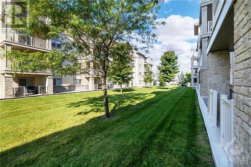 Enjoy the peaceful common grounds off the balcony - 151 Potts Private Unit#107, Ottawa, ON - Outdoor With Balcony