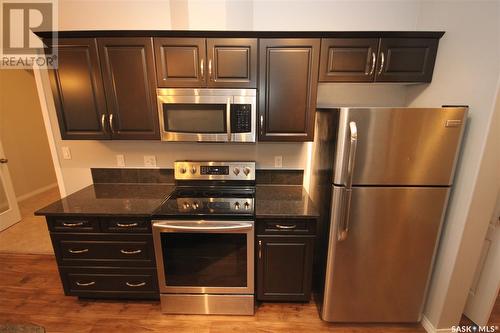 204 3818 Dewdney Avenue E, Regina, SK - Indoor Photo Showing Kitchen With Stainless Steel Kitchen