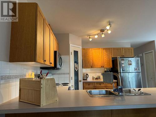 10A Wolf  Crescent, Invermere, BC - Indoor Photo Showing Kitchen With Double Sink