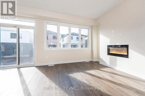 59 Downriver Drive, Welland, ON - Indoor Photo Showing Living Room With Fireplace