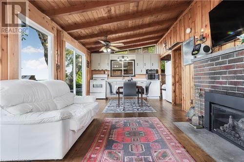 1950 Shore Lane, Wasaga Beach, ON - Indoor Photo Showing Living Room With Fireplace