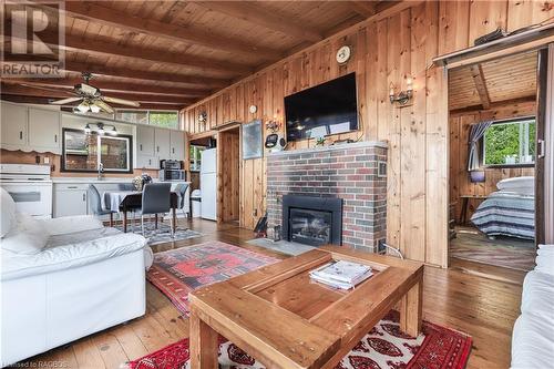 1950 Shore Lane, Wasaga Beach, ON - Indoor Photo Showing Living Room With Fireplace