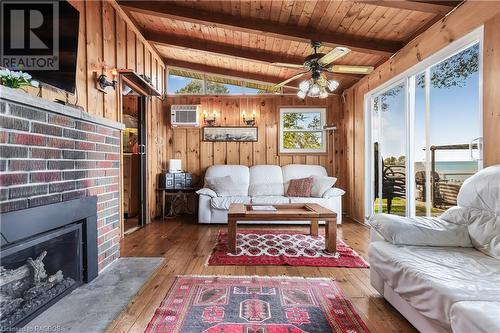 1950 Shore Lane, Wasaga Beach, ON - Indoor Photo Showing Living Room With Fireplace