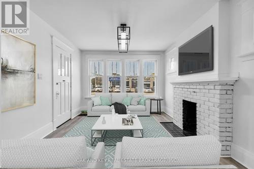 348 Wharncliffe Road S, London, ON - Indoor Photo Showing Living Room With Fireplace