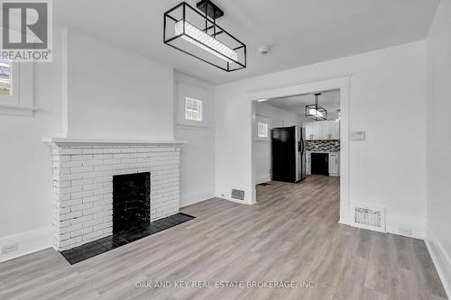 348 Wharncliffe Road S, London, ON - Indoor With Fireplace