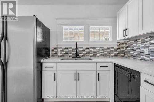 348 Wharncliffe Road S, London, ON - Indoor Photo Showing Kitchen With Double Sink With Upgraded Kitchen