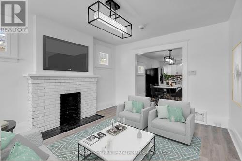 348 Wharncliffe Road S, London, ON - Indoor Photo Showing Living Room With Fireplace