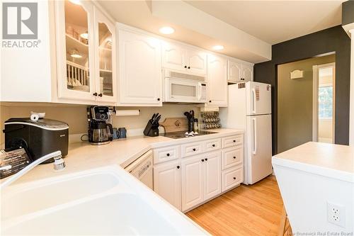 145 Highland Drive, Hampton, NB - Indoor Photo Showing Kitchen With Double Sink