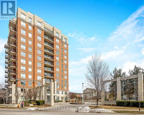 702 - 2365 Central Park Drive, Oakville, ON - Outdoor With Facade