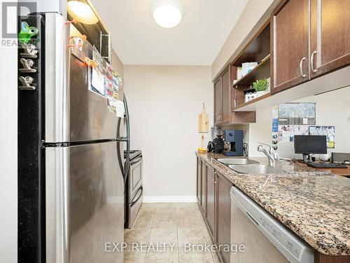 702 - 2365 Central Park Drive, Oakville, ON - Indoor Photo Showing Kitchen With Double Sink