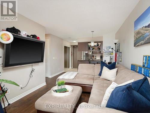 702 - 2365 Central Park Drive, Oakville, ON - Indoor Photo Showing Living Room