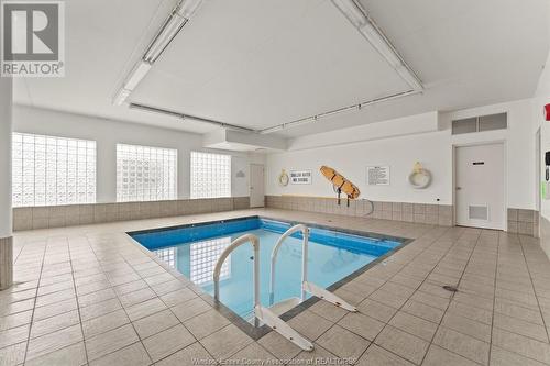 4789 Riverside Drive Unit# 1206, Windsor, ON - Indoor Photo Showing Other Room With In Ground Pool