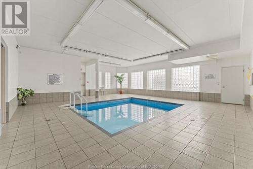 4789 Riverside Drive Unit# 1206, Windsor, ON - Indoor Photo Showing Other Room With In Ground Pool