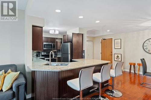 4789 Riverside Drive Unit# 1206, Windsor, ON - Indoor Photo Showing Kitchen With Double Sink