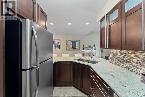 4789 Riverside Drive Unit# 1206, Windsor, ON - Indoor Photo Showing Kitchen With Double Sink