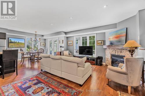 9 Mulligan Lane, Georgian Bay, ON - Indoor Photo Showing Living Room With Fireplace