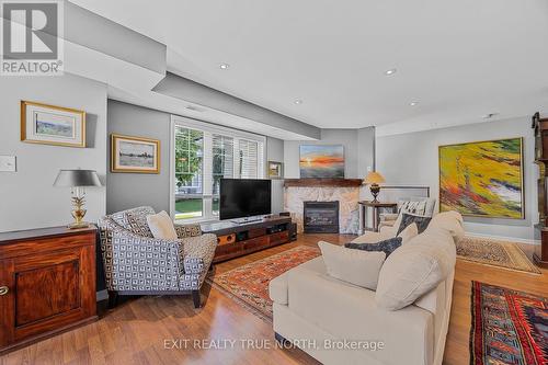 9 Mulligan Lane, Georgian Bay, ON - Indoor Photo Showing Living Room With Fireplace