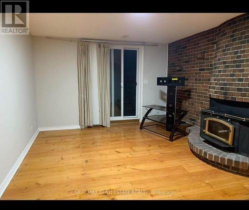 Bsmt - 2902 Windjammer Road, Mississauga (Erin Mills), ON - Indoor With Fireplace