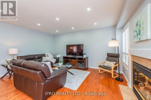 17 Frontenac Crescent, Brampton (Fletcher'S Meadow), ON - Indoor Photo Showing Living Room With Fireplace