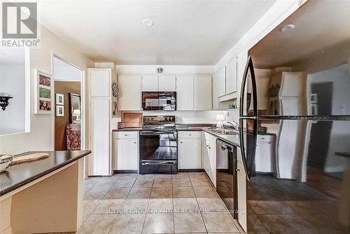 401 - 1400 Dixie Road, Mississauga, ON - Indoor Photo Showing Kitchen