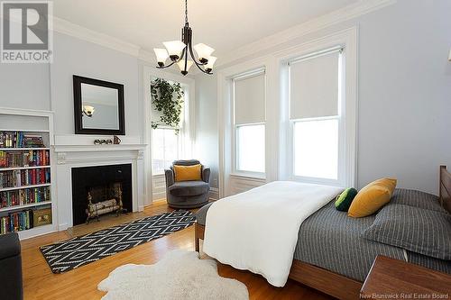 122 Carmarthen Street, Saint John, NB - Indoor Photo Showing Bedroom With Fireplace