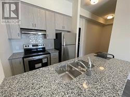 104 - 200 Lagerfeld Drive, Brampton, ON - Indoor Photo Showing Kitchen With Stainless Steel Kitchen With Double Sink With Upgraded Kitchen