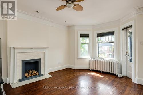 2A - 321 Palmerston Boulevard, Toronto, ON - Indoor Photo Showing Living Room With Fireplace